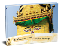 A {Phool} in Nepal, with a photograph of a golden Buddhist stupa on the cover
